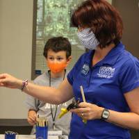 A teacher explains what the students are doing